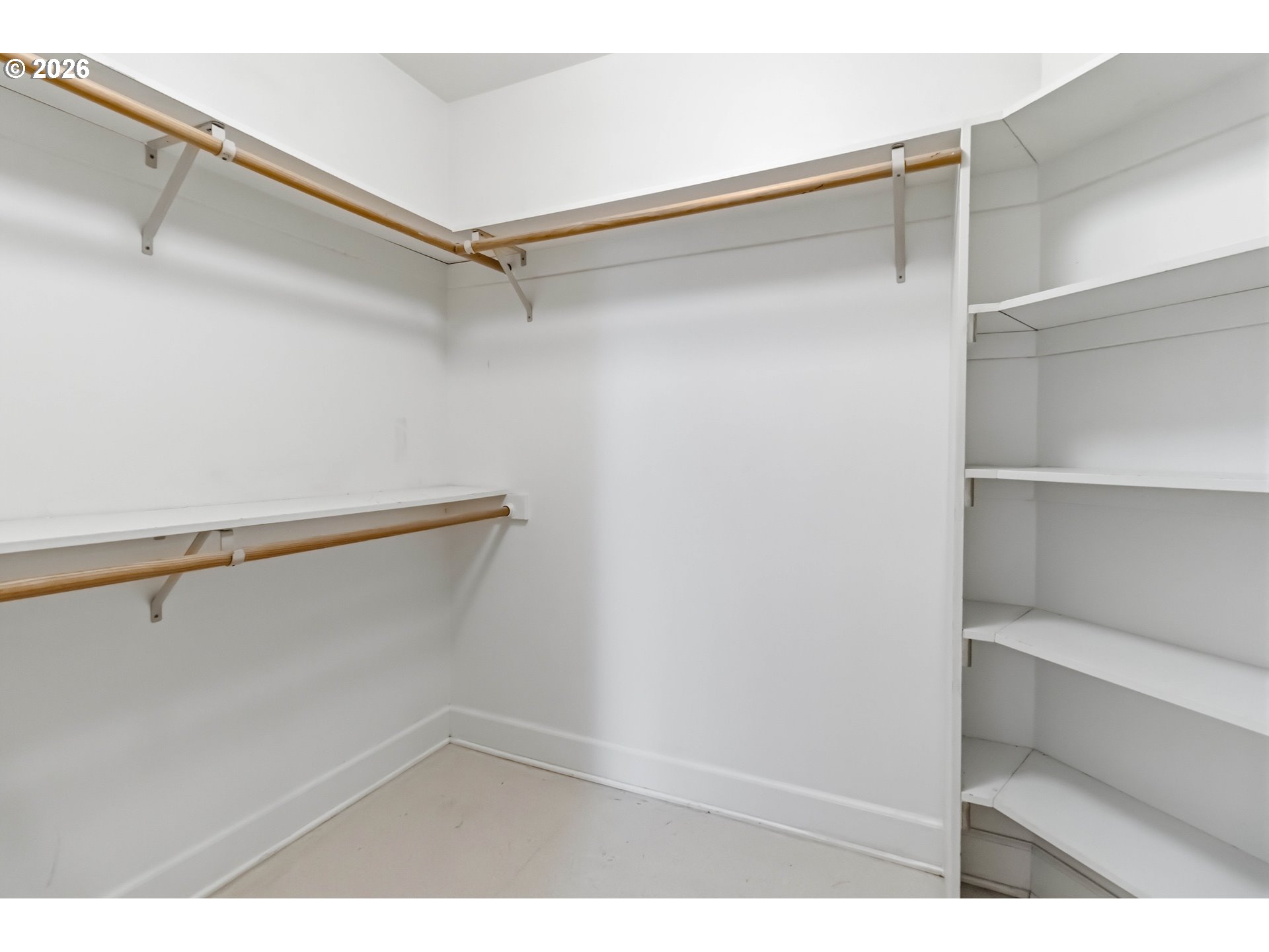 3008 Garfield Street Longview, WA 98632 - Photo 36 of 45 a view of walk in closet with empty racks