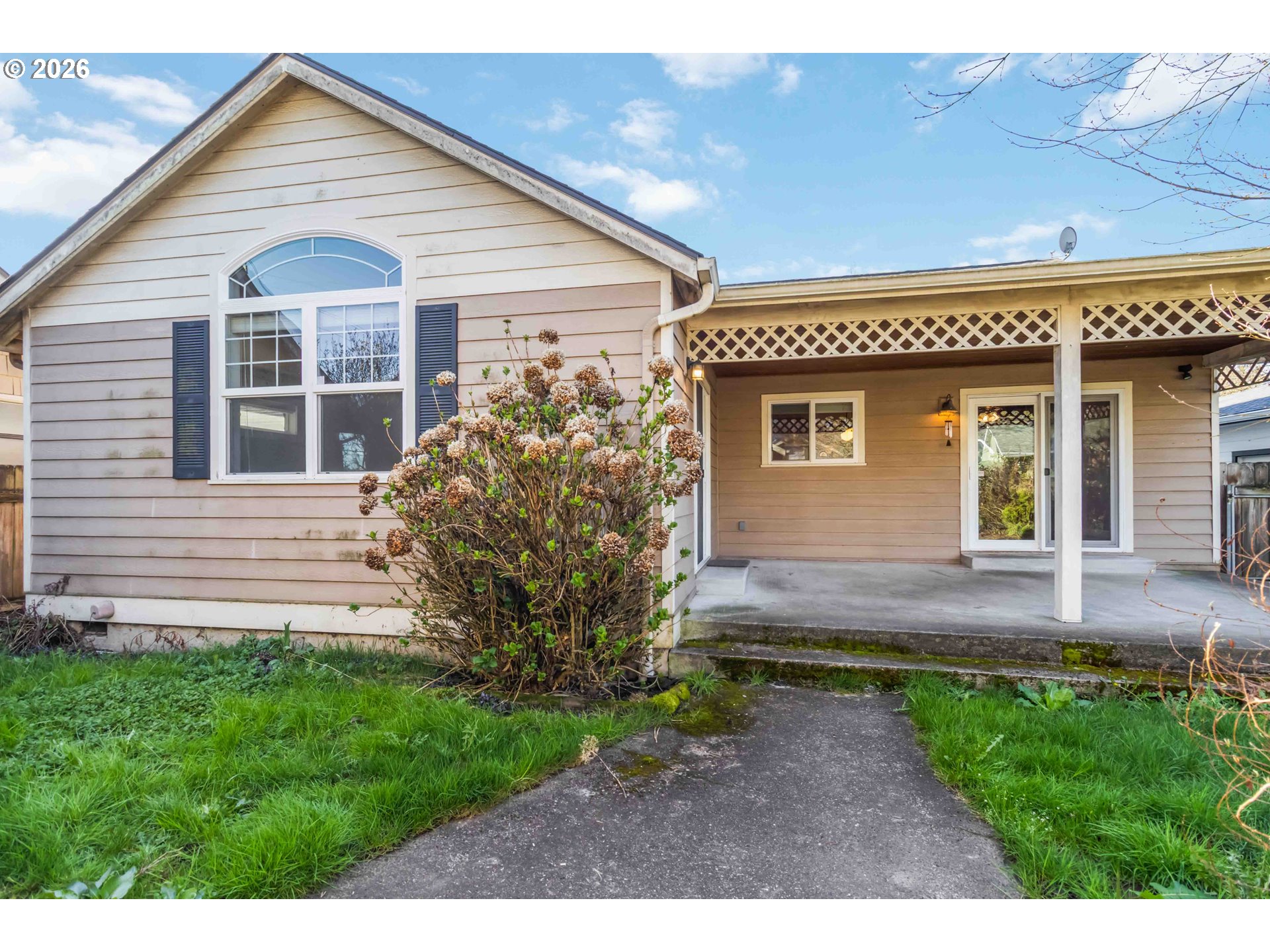3008 Garfield Street Longview, WA 98632 - Photo 41 of 45 a view of a house with a yard plants and large tree