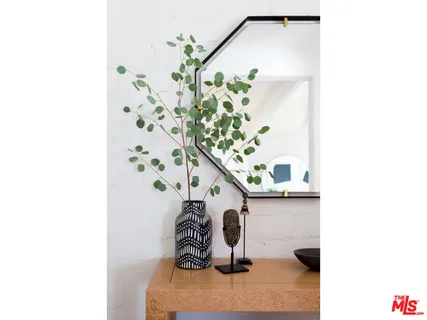 a picture of a bathroom with a sink and mirror