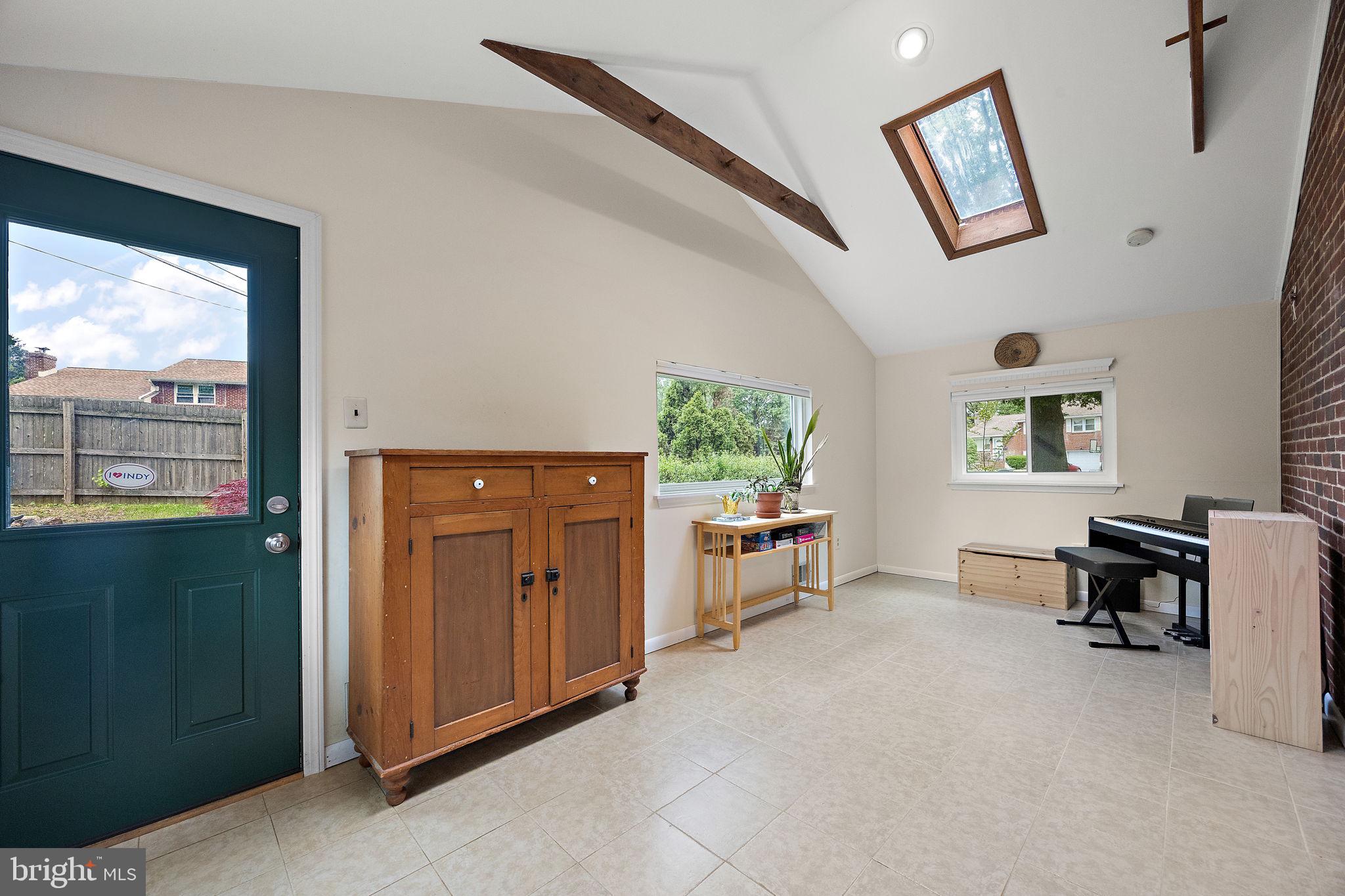 601 Riverview Road Claymont, DE 19703 - Photo 11 of 33 a view of a workspace with furniture and a window