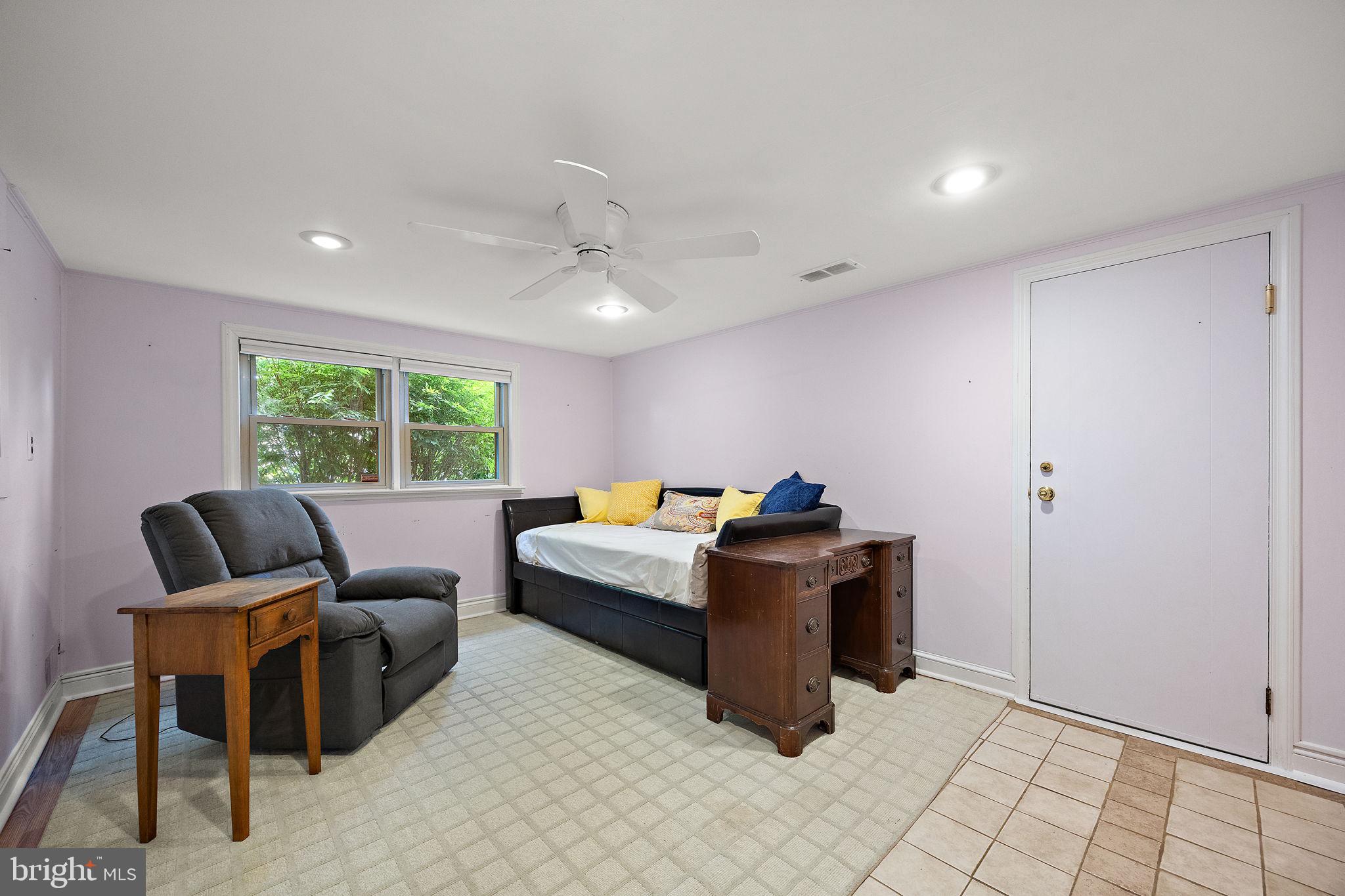 601 Riverview Road Claymont, DE 19703 - Photo 13 of 33 a living room with furniture and a window