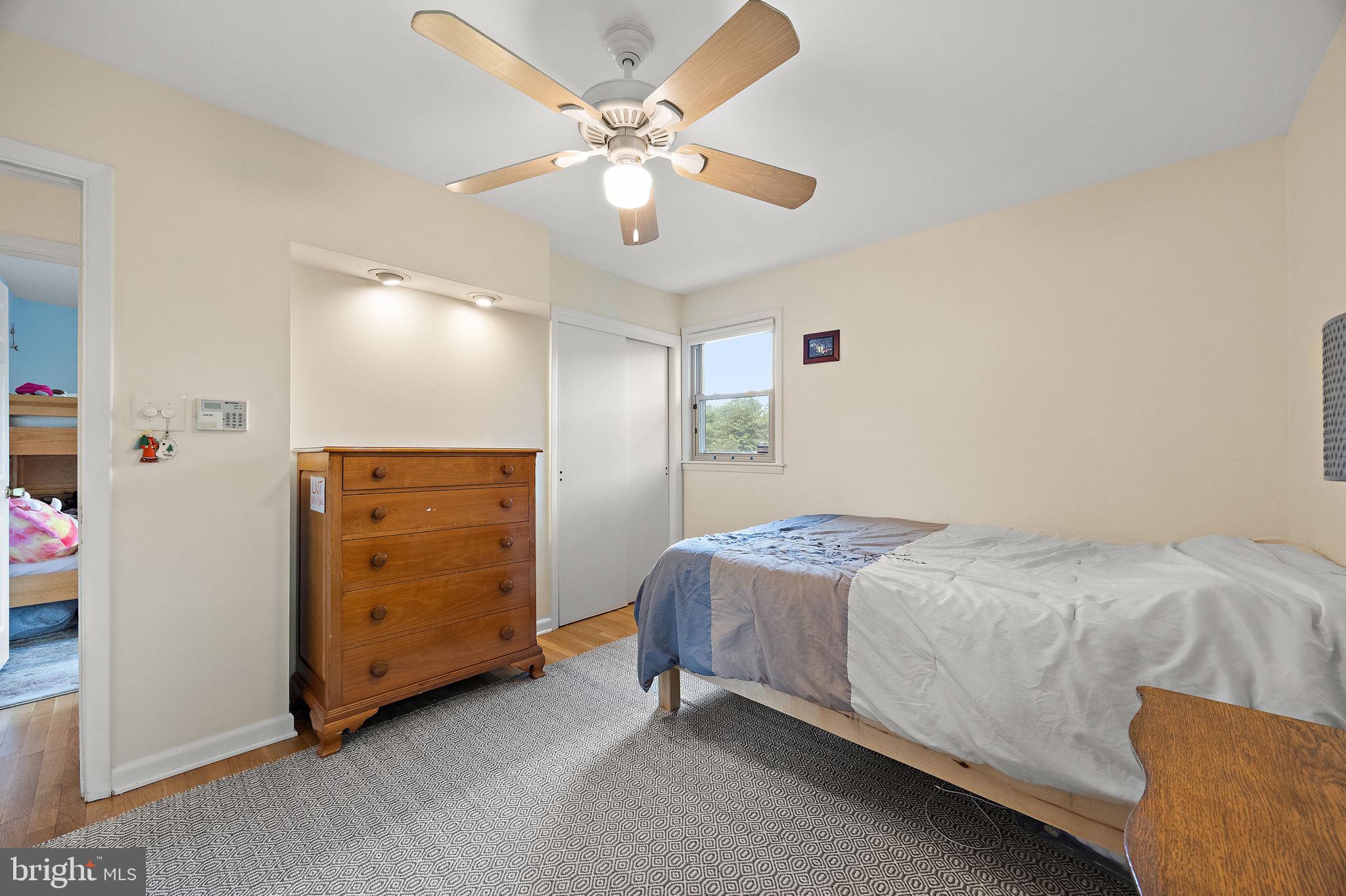 601 Riverview Road Claymont, DE 19703 - Photo 22 of 33 a bedroom with a bed and a ceiling fan