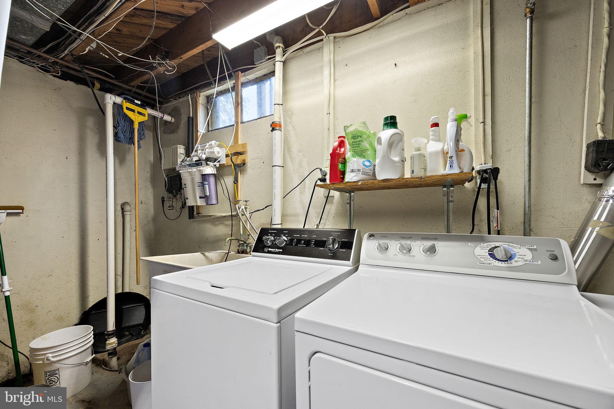 601 Riverview Road Claymont, DE 19703 - Photo 26 of 33 a utility room with dryer and washer