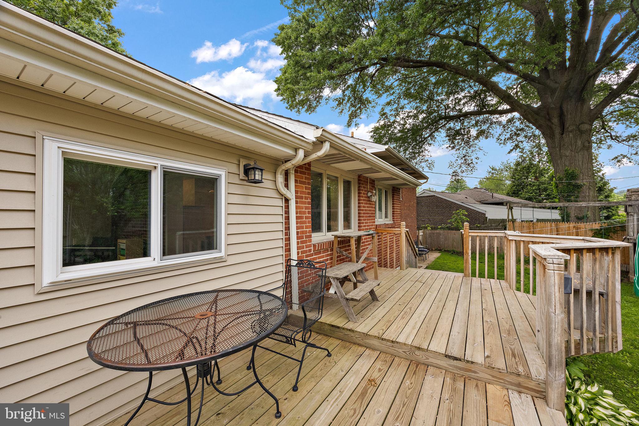 601 Riverview Road Claymont, DE 19703 - Photo 27 of 33 a view of a house with a chairs on wooden deck