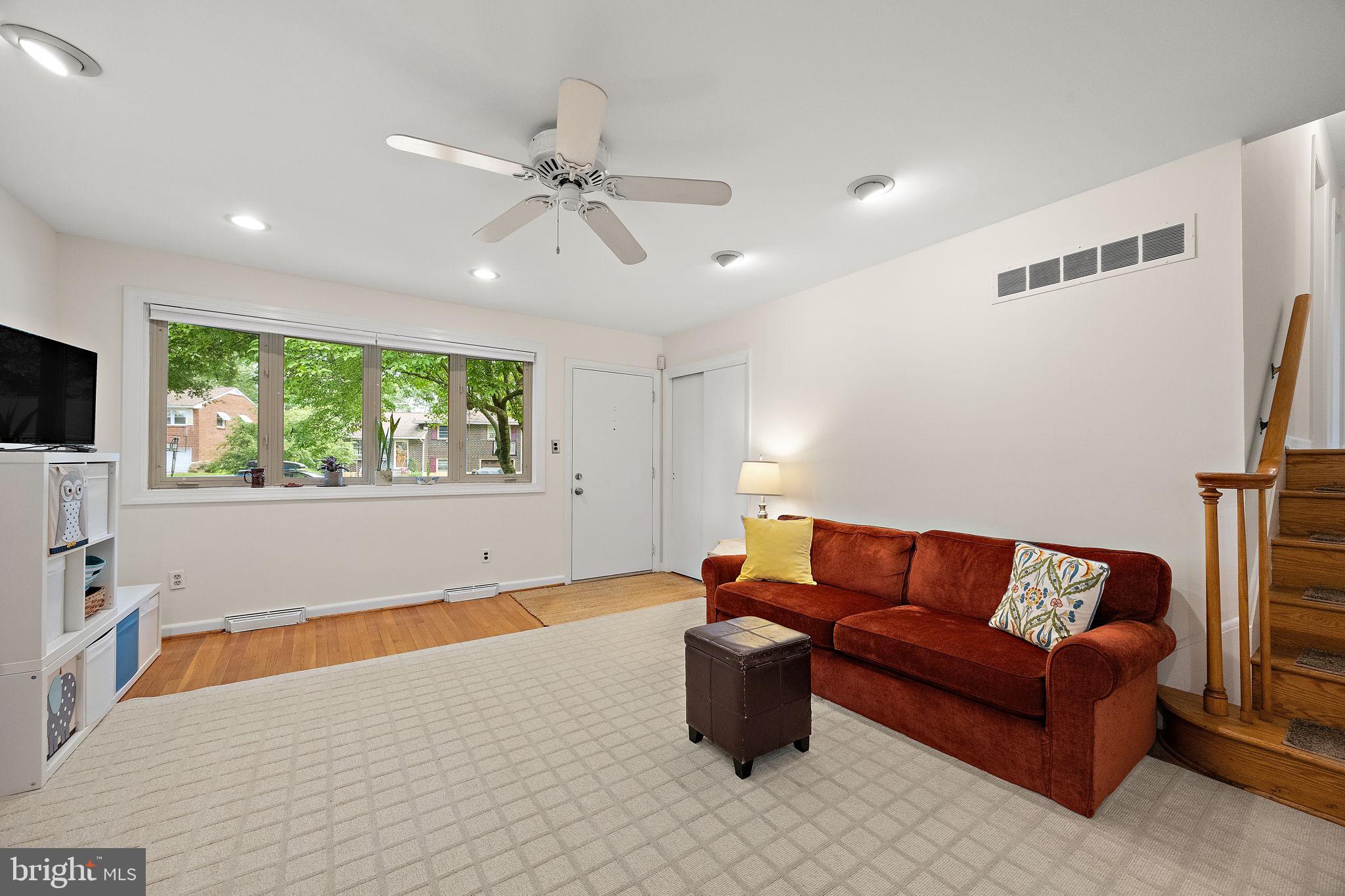 601 Riverview Road Claymont, DE 19703 - Photo 3 of 33 a living room with furniture and a flat screen tv
