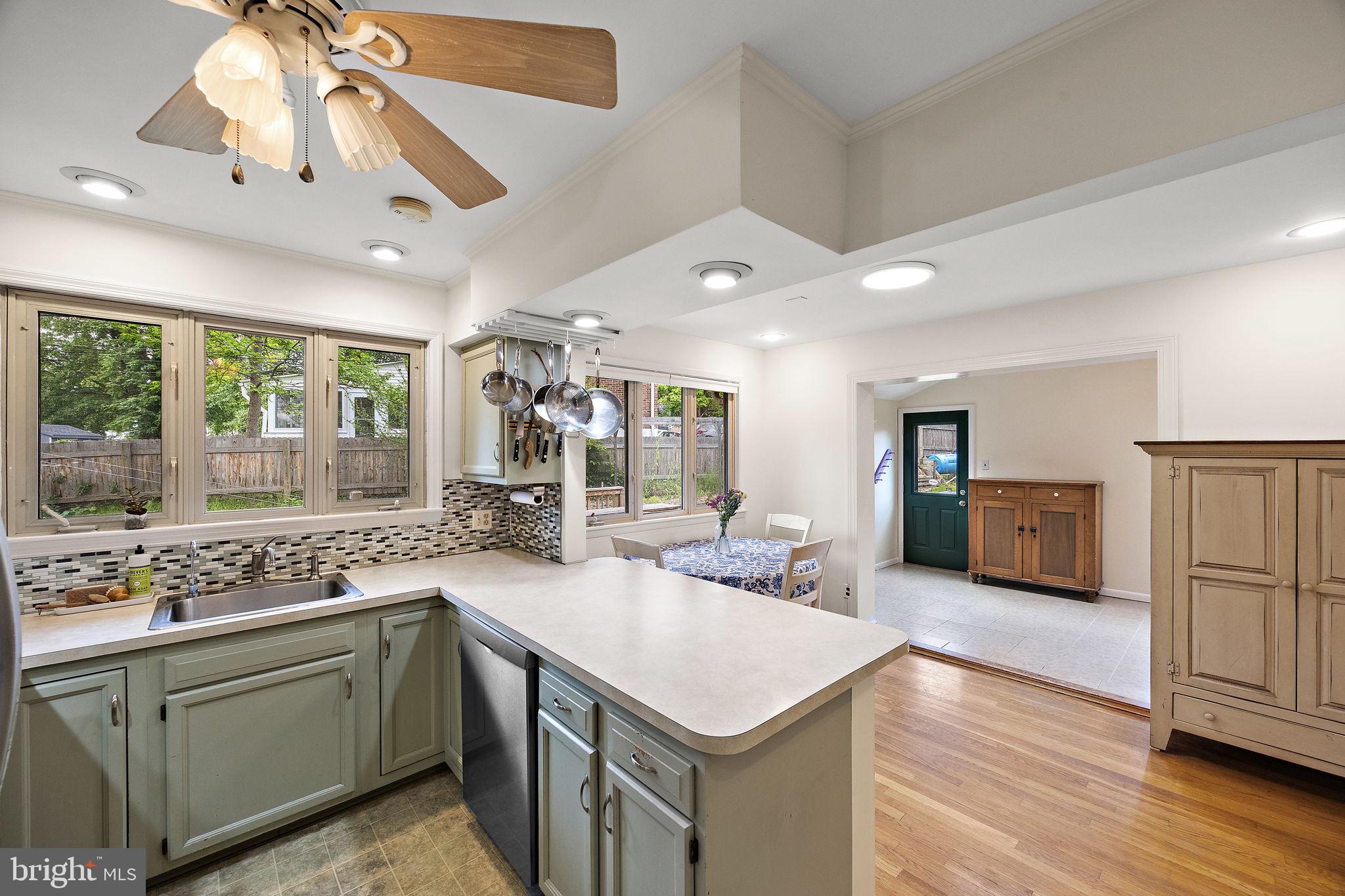 601 Riverview Road Claymont, DE 19703 - Photo 8 of 33 a kitchen with a sink and wooden cabinets