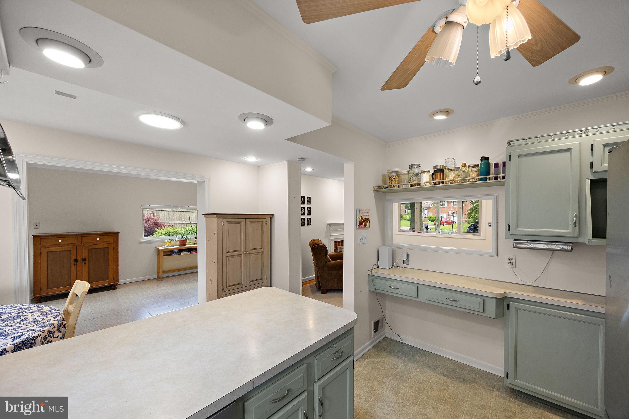 601 Riverview Road Claymont, DE 19703 - Photo 10 of 33 a living room with stainless steel appliances kitchen island furniture and a kitchen view