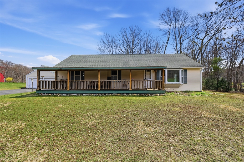 240 Upper Road Deerfield, MA 01342 - Photo 4 of 42 a front view of a house with a garden