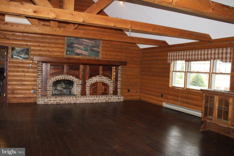 1400 Lisburn Road Wellsville, PA 17365 - Photo 4 of 9 a view of a house with wooden floor