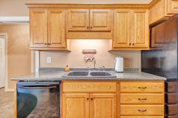 a bedroom with furniture and a chandelier