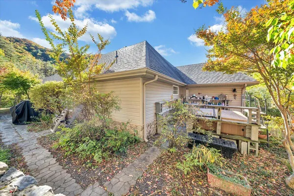 a view of an aerial view of residential house and swimming pool
