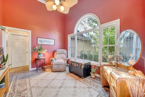 a view of a dining room with furniture window and outside view