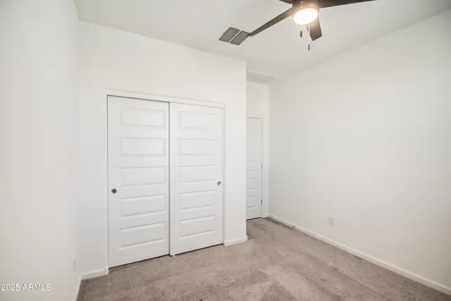 an empty room with closet