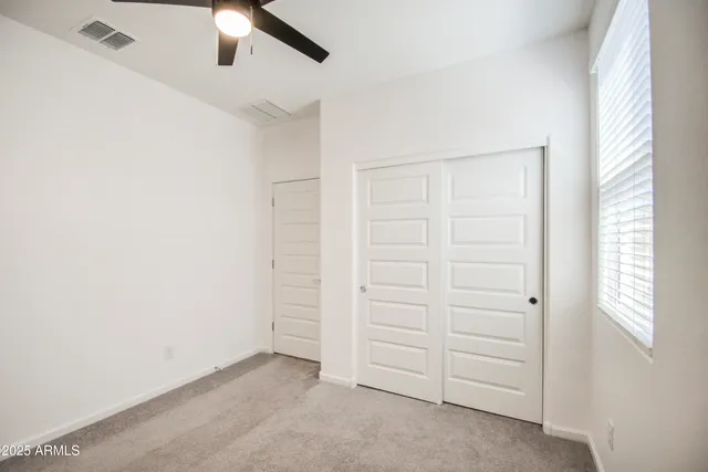 an empty room with closet