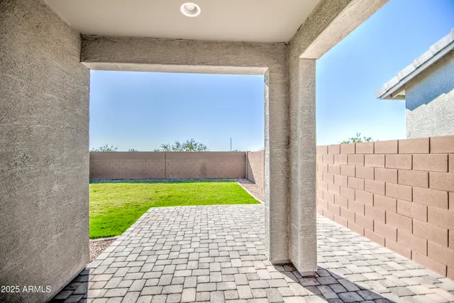a view of porch with a yard