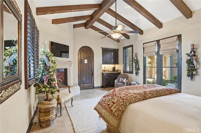 a view of a hallway with wooden floor and windows