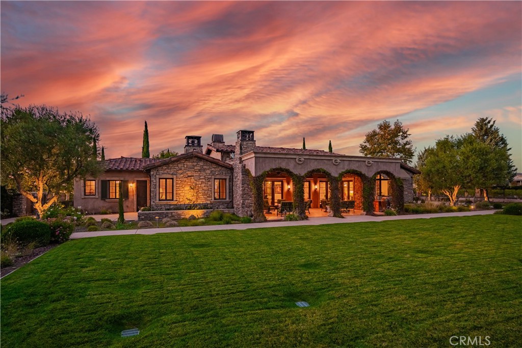 34965 Via Del Ponte Temecula Ca Temecula, CA 92592 - Photo 4 of 75 a view of a big house with a big yard and large trees
