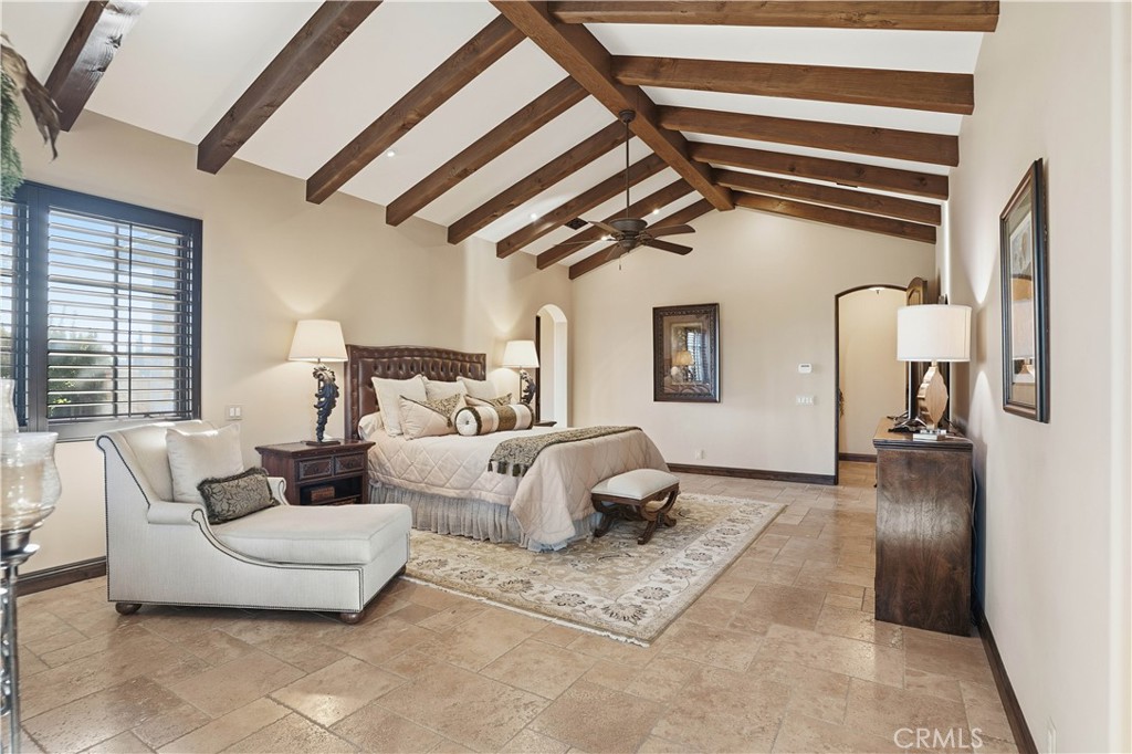 34965 Via Del Ponte Temecula Ca Temecula, CA 92592 - Photo 48 of 75 a living room with furniture and a floor to ceiling window