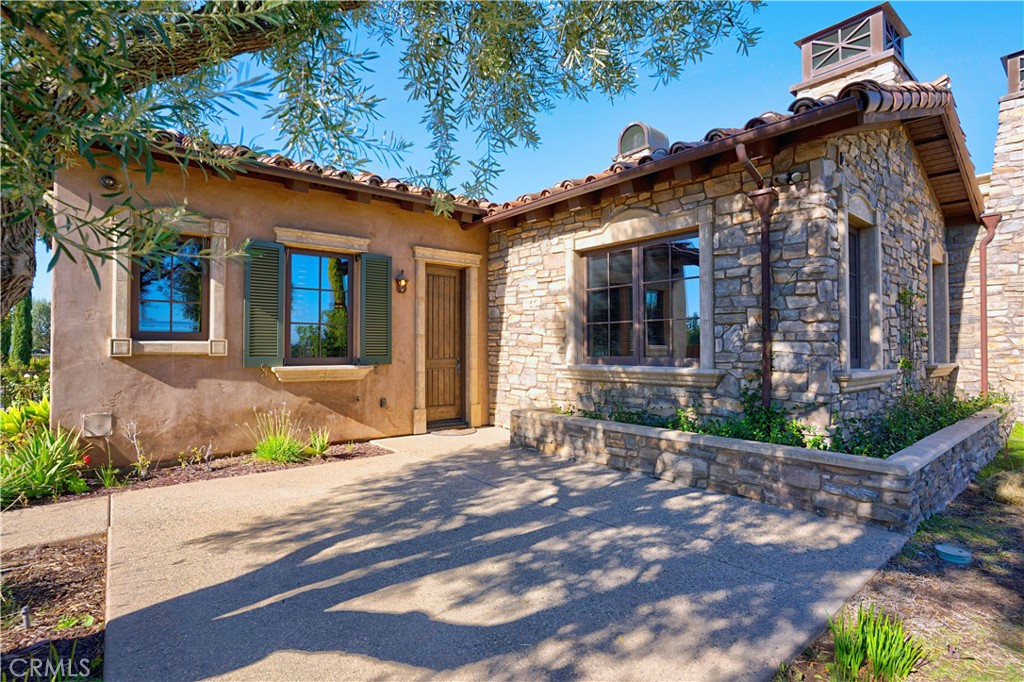 34965 Via Del Ponte Temecula Ca Temecula, CA 92592 - Photo 55 of 75 a front view of a house with garden