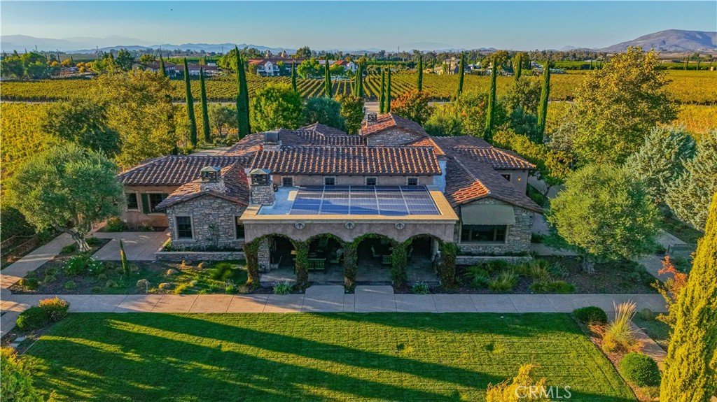 34965 Via Del Ponte Temecula Ca Temecula, CA 92592 - Photo 6 of 75 a aerial view of a house with swimming pool garden and lake view