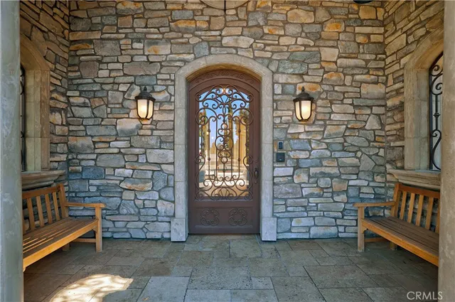 a bedroom with a large bed and window