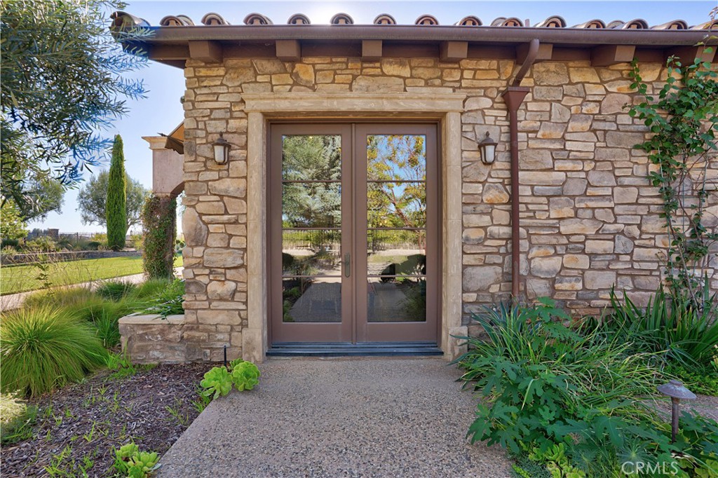 34965 Via Del Ponte Temecula Ca Temecula, CA 92592 - Photo 65 of 75 a front view of a house with garden