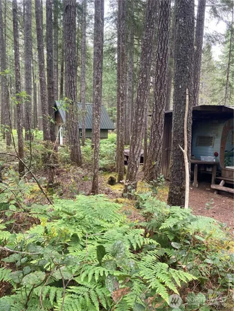 a backyard of a house with seating space