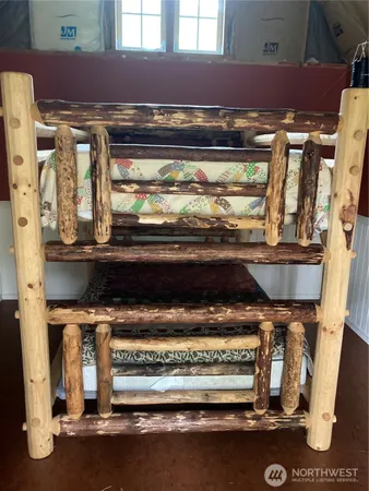 a stove top oven sitting inside of a kitchen