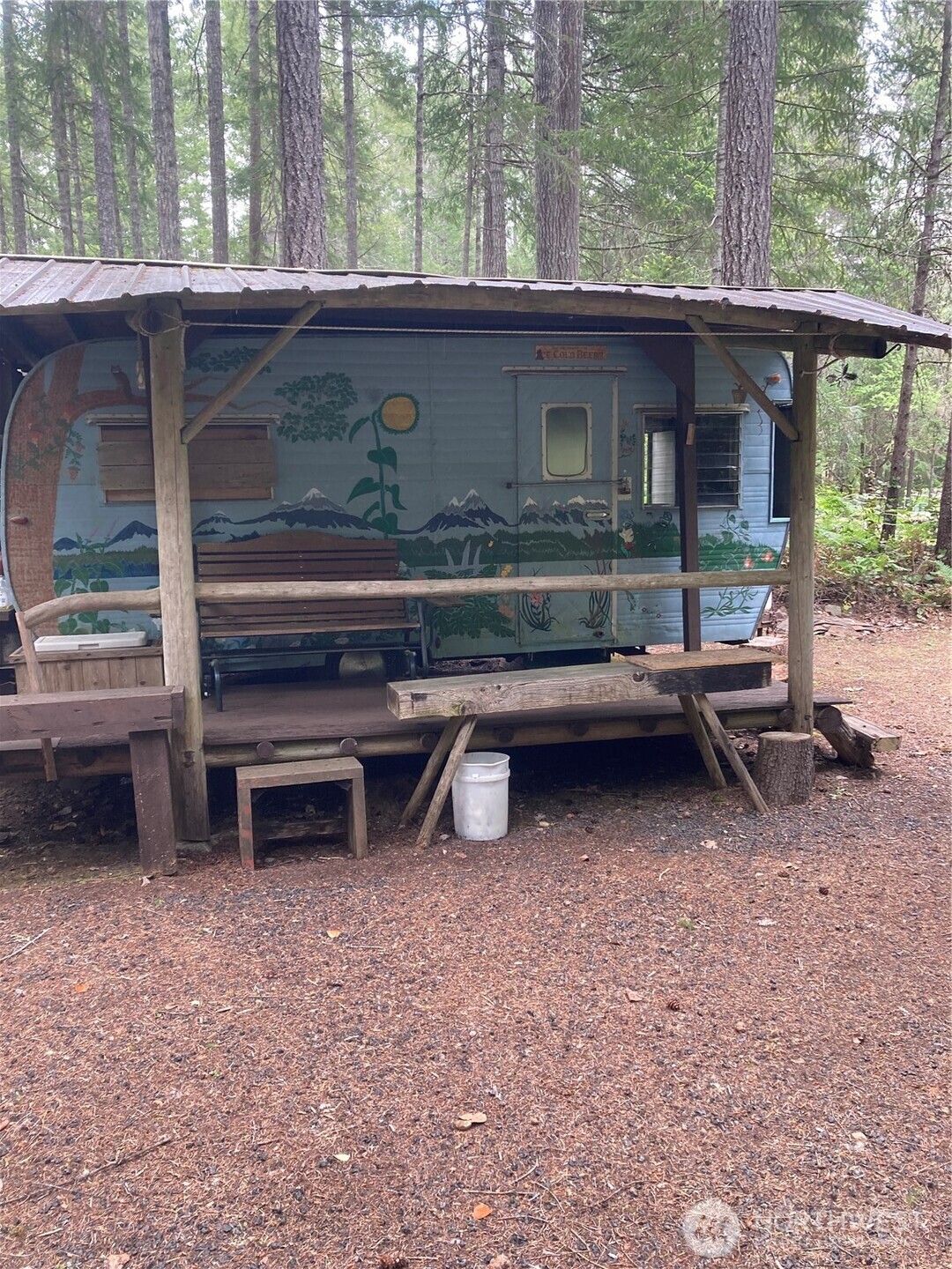 40 Snapper Drive Hoodsport, WA 98548 - Photo 9 of 13 front view of a house with a backyard