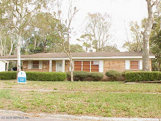5839 Rover Jacksonville, FL 32244 - Photo 1 of 1 a front view of a house with a yard