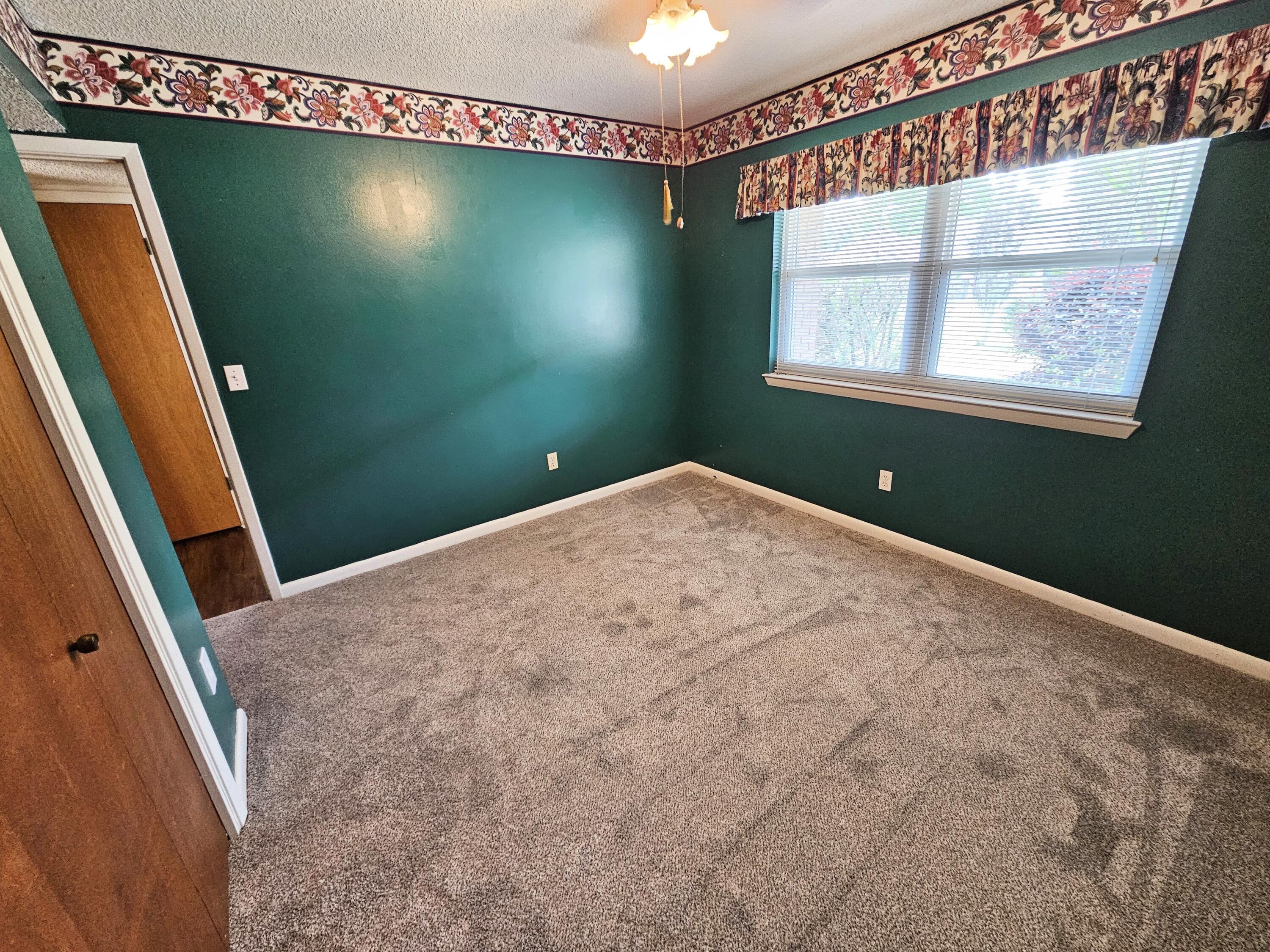 129 12th Avenue Shalimar, FL 32579 - Photo 18 of 36 a view of a room with window and screen