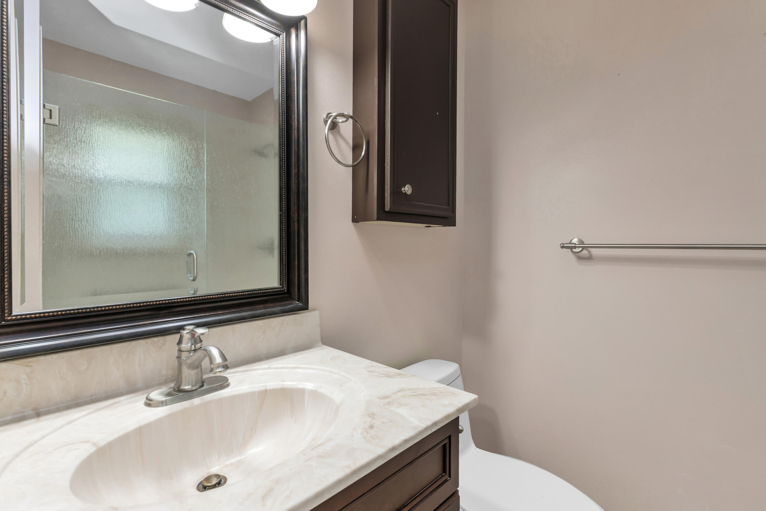 129 12th Avenue Shalimar, FL 32579 - Photo 26 of 36 a bathroom with a sink and a toilet