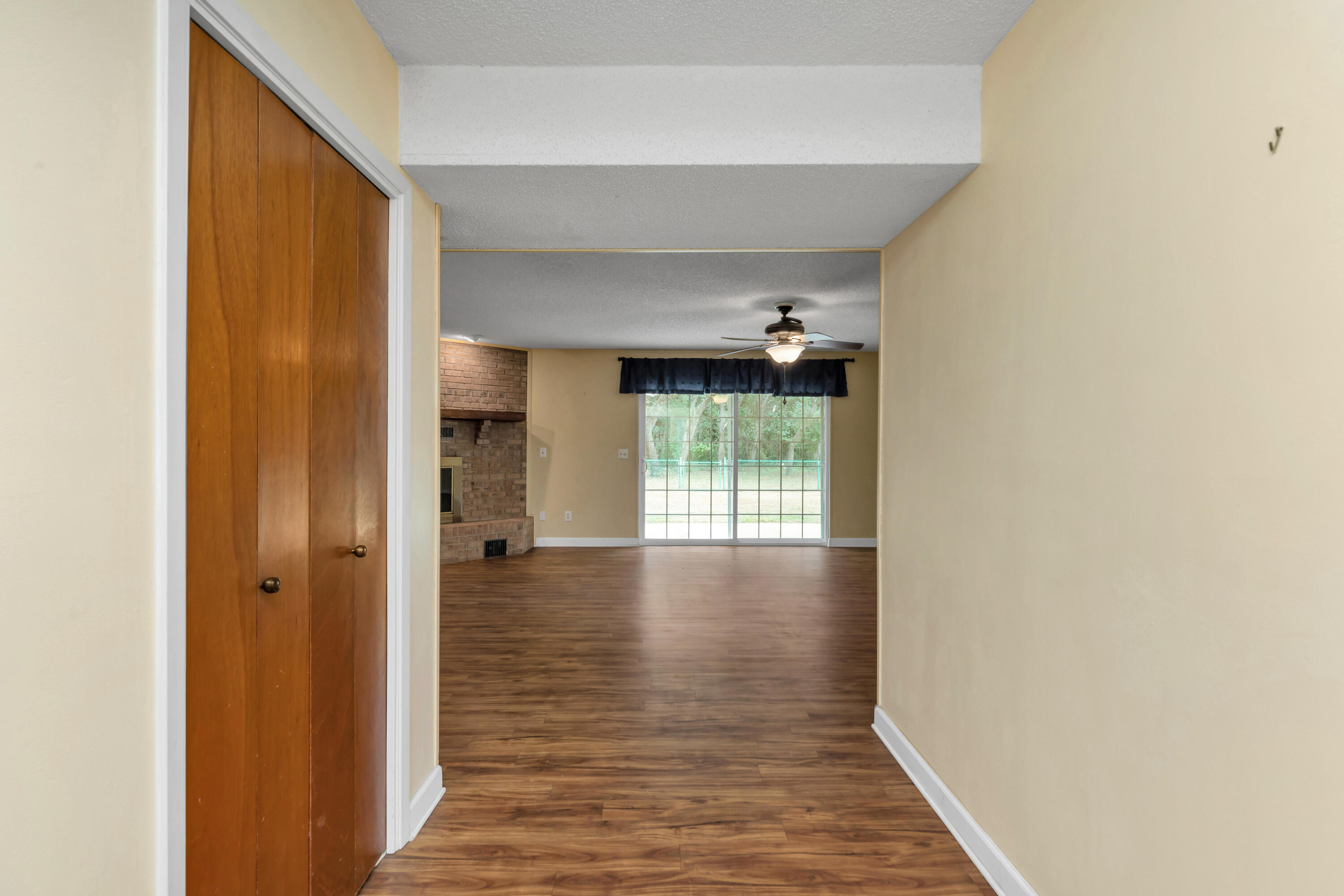 129 12th Avenue Shalimar, FL 32579 - Photo 3 of 36 a view of hallway with wooden floor