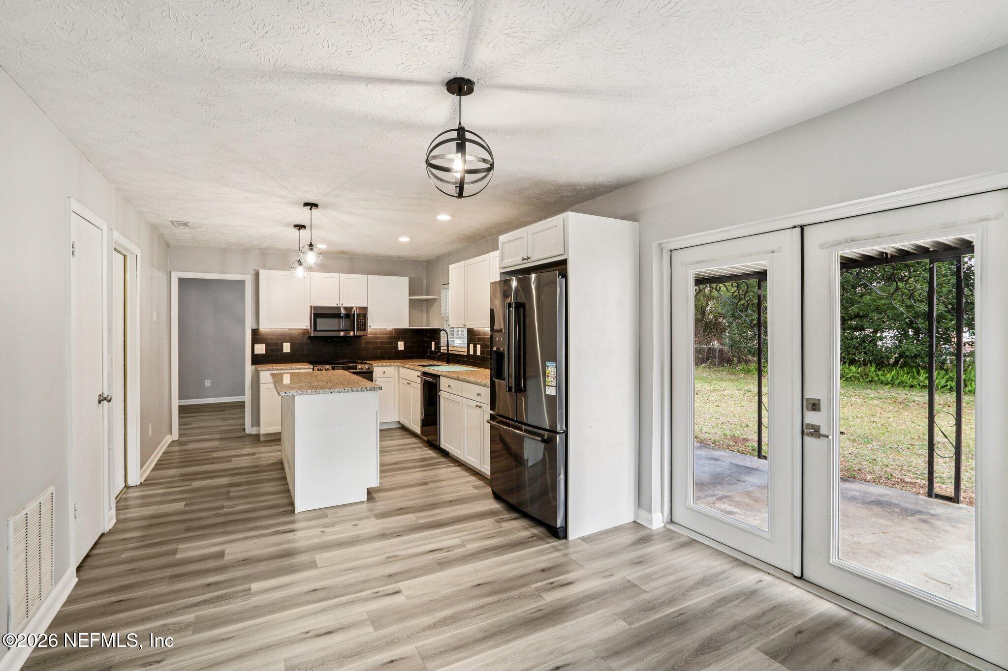 7815 Old Kings Road South Jacksonville, FL 32217 - Photo 12 of 28 KITCHEN AND DINING AREA