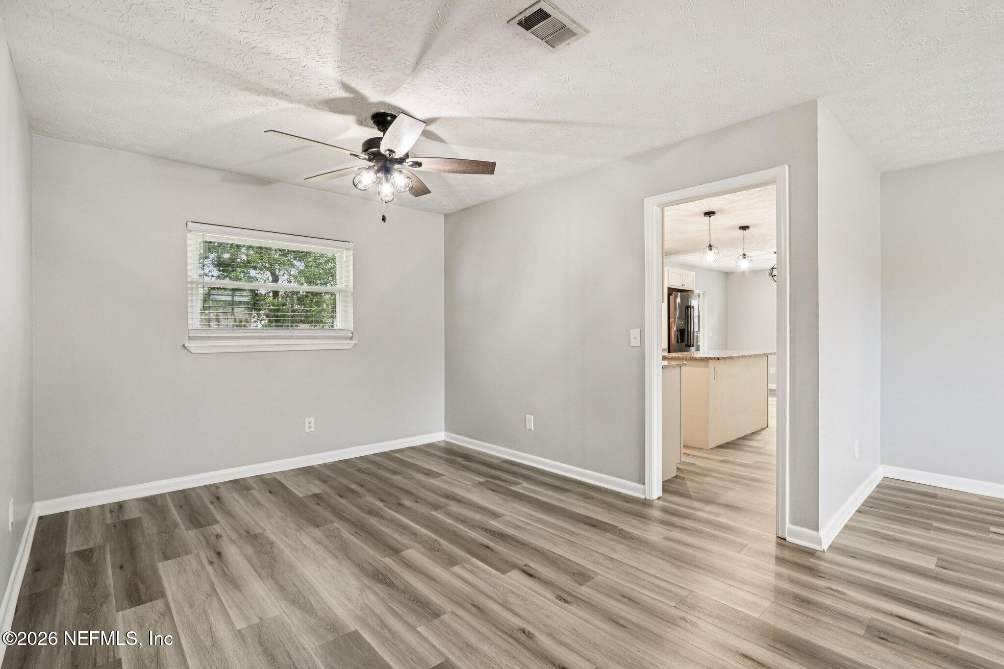 7815 Old Kings Road South Jacksonville, FL 32217 - Photo 9 of 28 FAMILY ROOM TO KITCHEN
