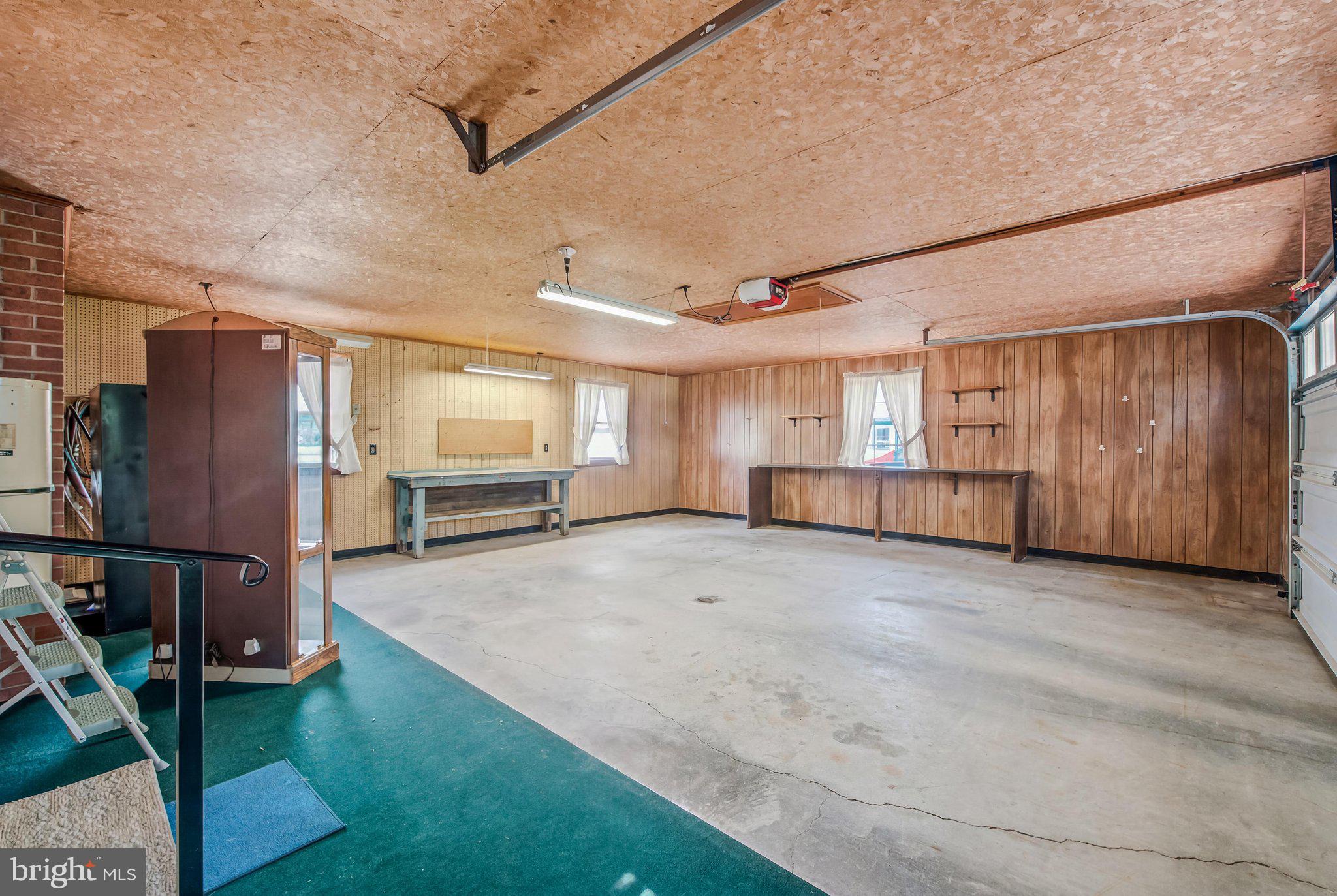3203 Charles Town Road Kearneysville, WV 25430 - Photo 36 of 45 Oversized 2 car garage w/ work benches has space
