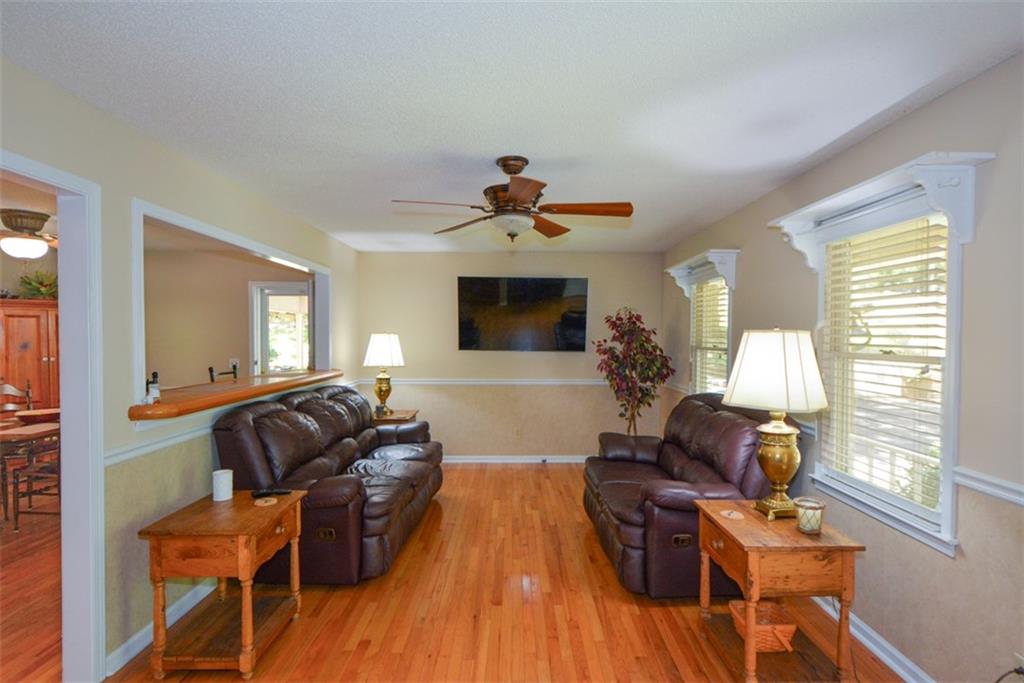 41 Clark Station Road Jasper, GA 30143 - Photo 15 of 69 a living room with furniture and a fireplace