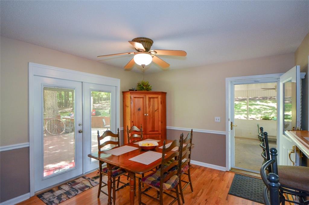 41 Clark Station Road Jasper, GA 30143 - Photo 22 of 69 a view of a dining room with furniture window and wooden floor