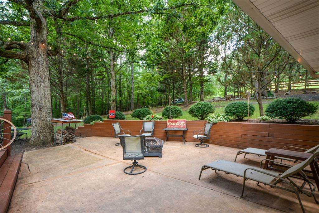 41 Clark Station Road Jasper, GA 30143 - Photo 3 of 69 a view of a backyard with sitting area