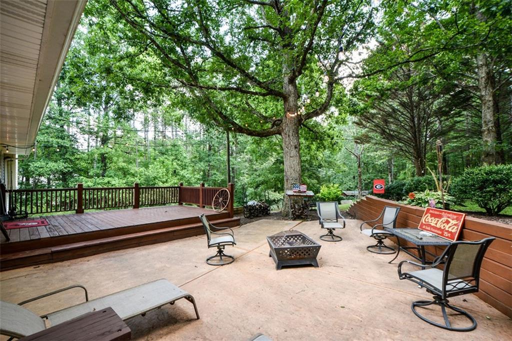 41 Clark Station Road Jasper, GA 30143 - Photo 4 of 69 a view of a backyard with sitting area