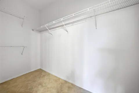 a view of a room with racks on the wall