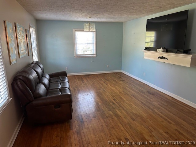 180 Castle Road Lumberton, NC 28358 - Photo 11 of 18 a living room with furniture and a flat screen tv