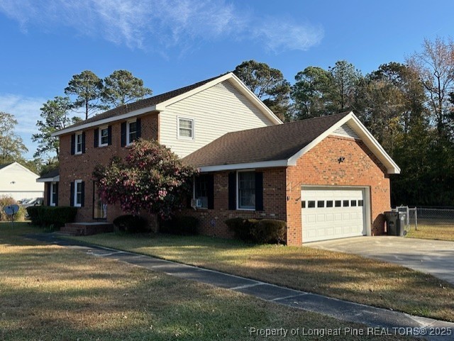 180 Castle Road Lumberton, NC 28358 - Photo 2 of 18 a view of a house next to a yard with big trees