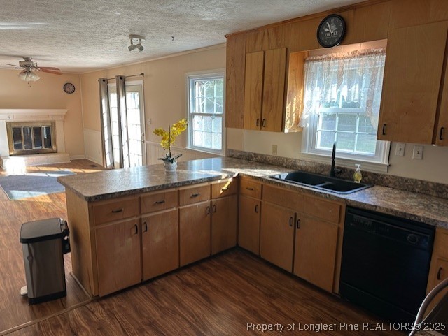 180 Castle Road Lumberton, NC 28358 - Photo 8 of 18 a kitchen with stainless steel appliances granite countertop wooden cabinets a sink and dishwasher with wooden floor