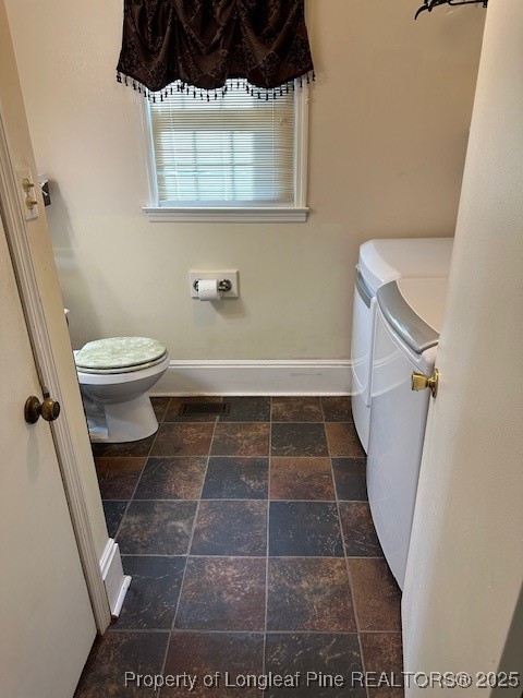 180 Castle Road Lumberton, NC 28358 - Photo 9 of 18 a bathroom with a toilet and a shower
