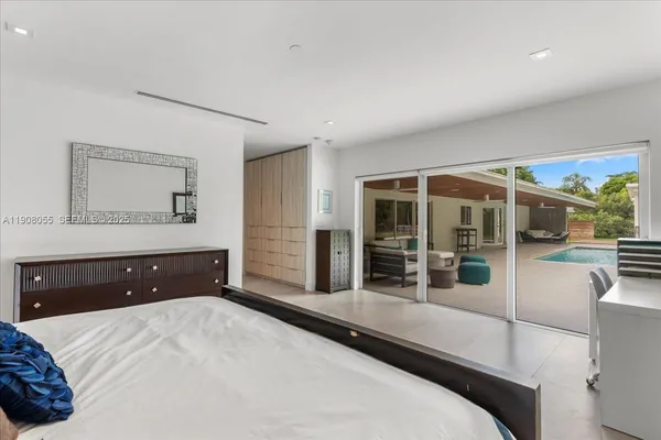 a spacious bathroom with a double vanity sink mirror double and shower