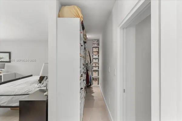a bathroom with a double vanity sink toilet and shower