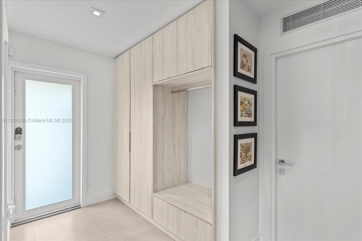 10105 Southwest 71st Avenue Pinecrest, FL 33156 - Photo 41 of 55 a view of front door