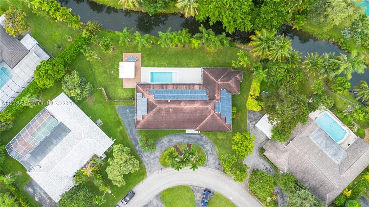 10105 Southwest 71st Avenue Pinecrest, FL 33156 - Photo 6 of 55 an aerial view of a house