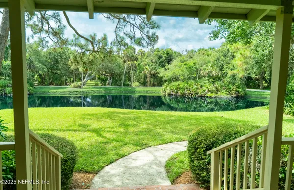 a view of a backyard with a garden